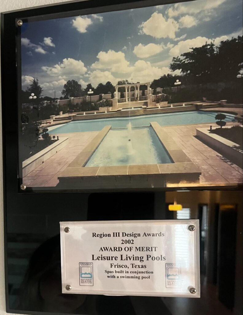 National Spa & Pool Institute 2002 Award of Merit plaque for Leisure Living Pools, Frisco, Texas luxury pool and spa design