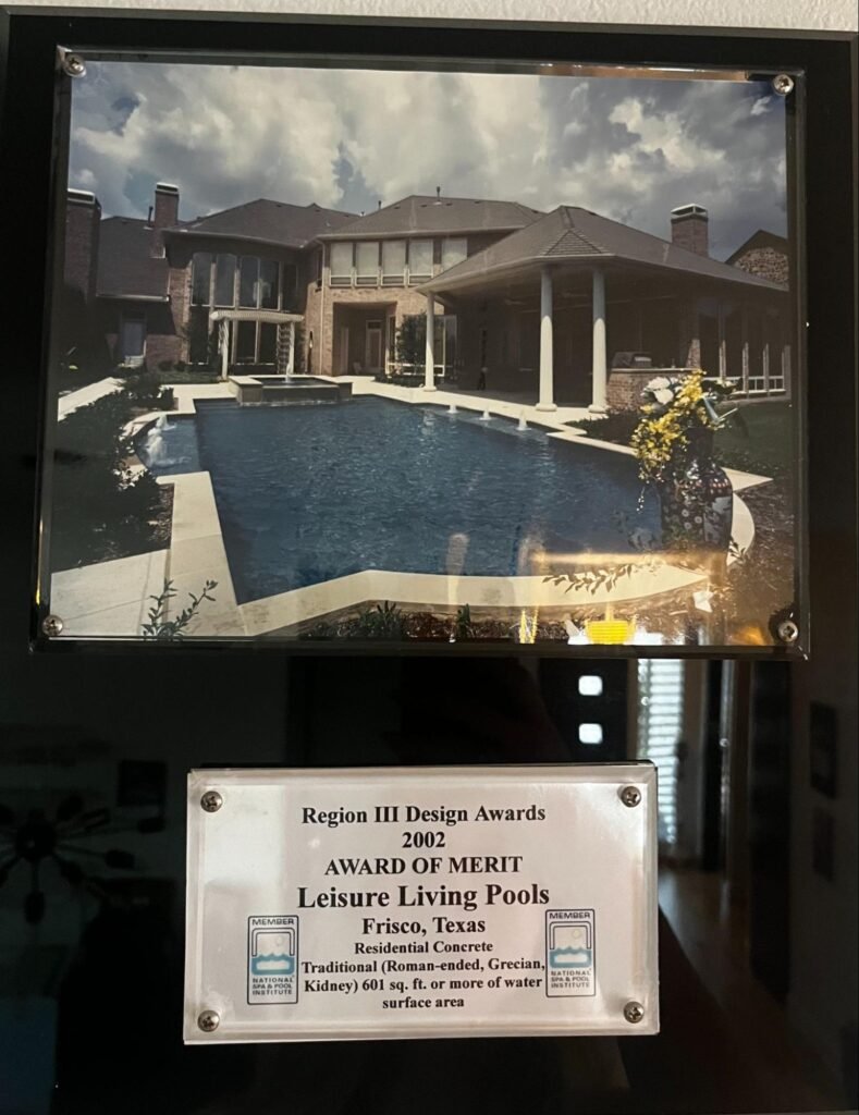 National Spa & Pool Institute 2002 Award of Merit plaque for Leisure Living Pools, Frisco, Texas traditional Roman-style kidney pool design